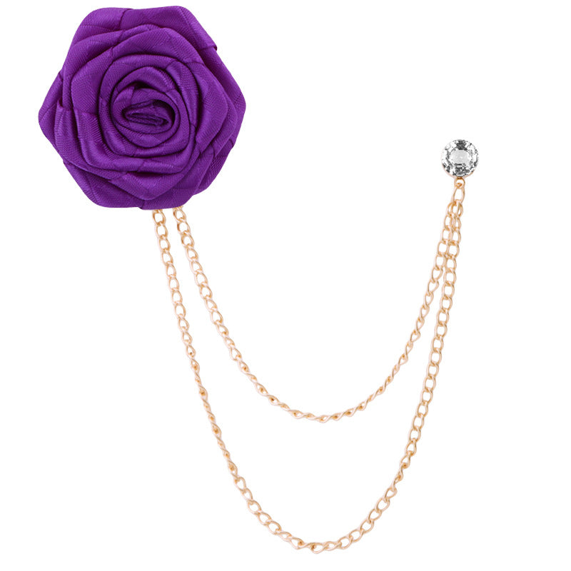 Rhinestone brooch next to fashion accessories