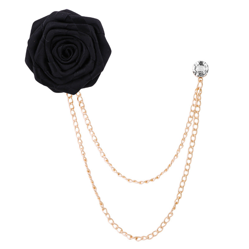 Elegant floral brooch displayed on wooden background