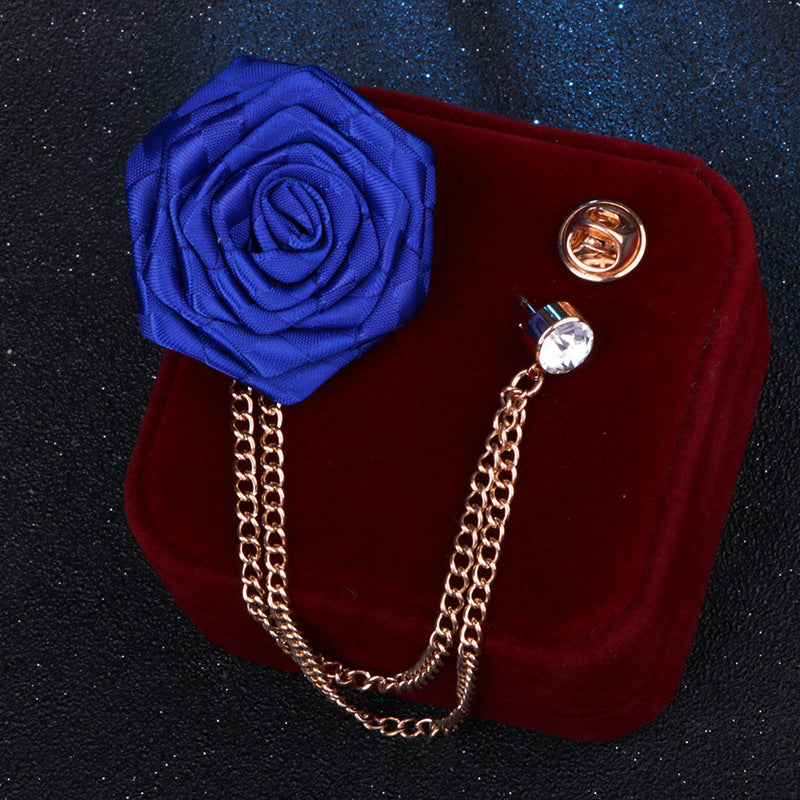Rhinestone brooch next to fashion accessories