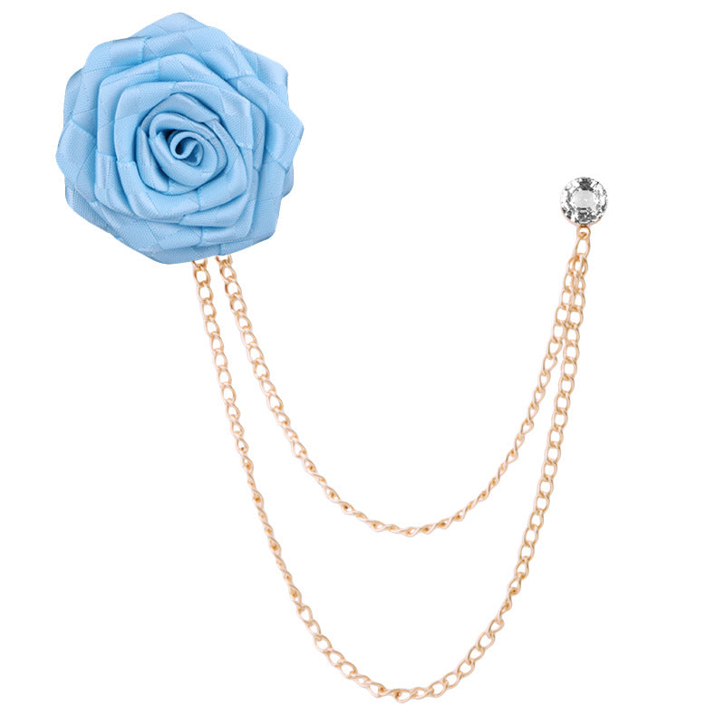 Rhinestone brooch next to fashion accessories