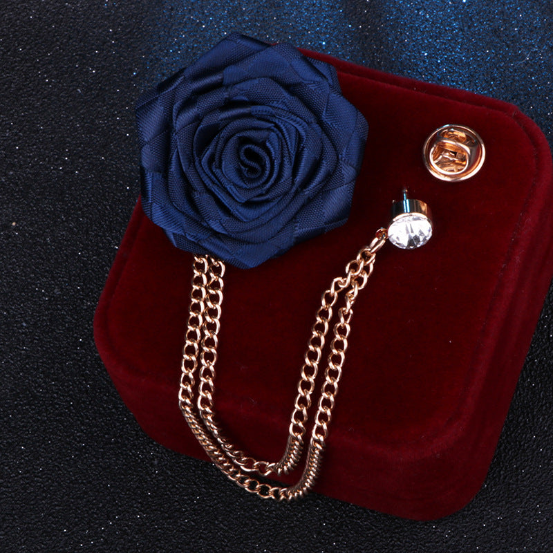 Rhinestone brooch next to fashion accessories