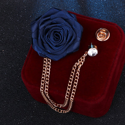 Rhinestone brooch next to fashion accessories
