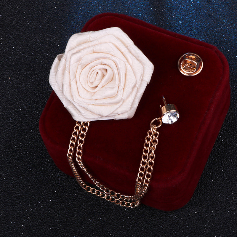Elegant floral brooch displayed on wooden background