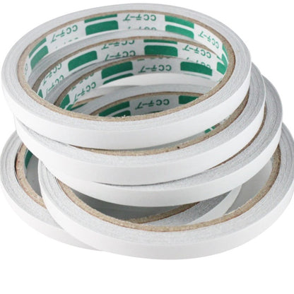 Visible adhesive layer on double-sided tape