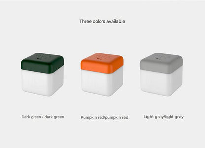 USB rechargeable compact LED cube light on desk