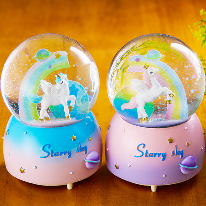 decorative unicorn music box with snow