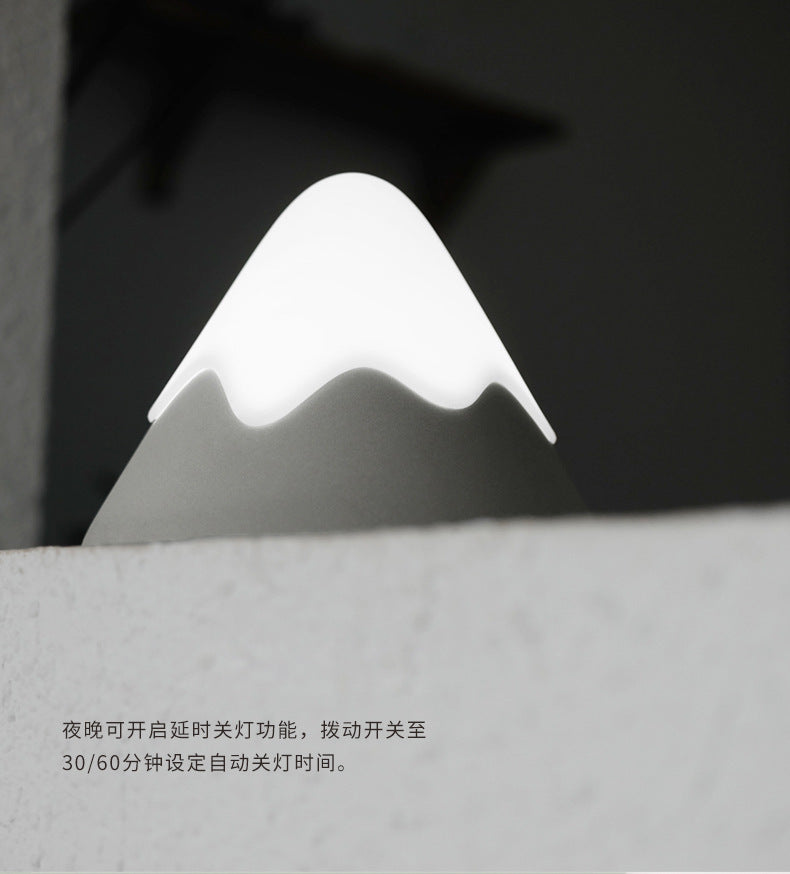 gray silicone mountain lamp in bedroom