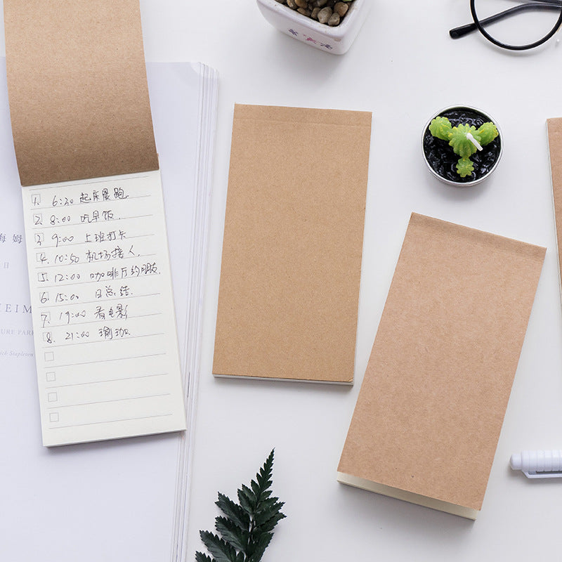 close-up of cream-colored notepad pages