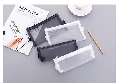 Black mesh pencil case close-up with zipper