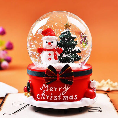 Rotating Christmas globe with falling snow effect