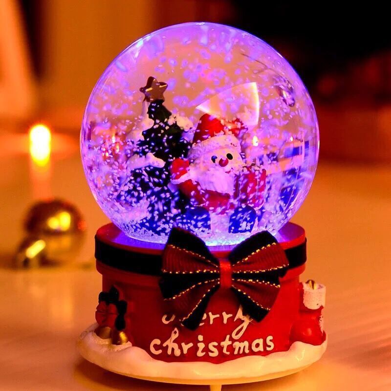 Santa figurine snow globe with LED lights