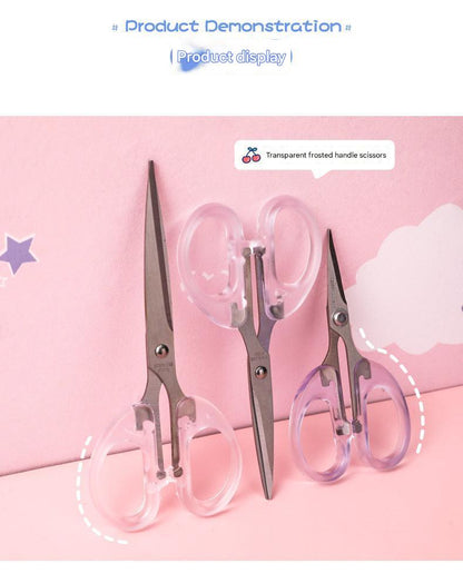 steel scissors with durable transparent handle isolated