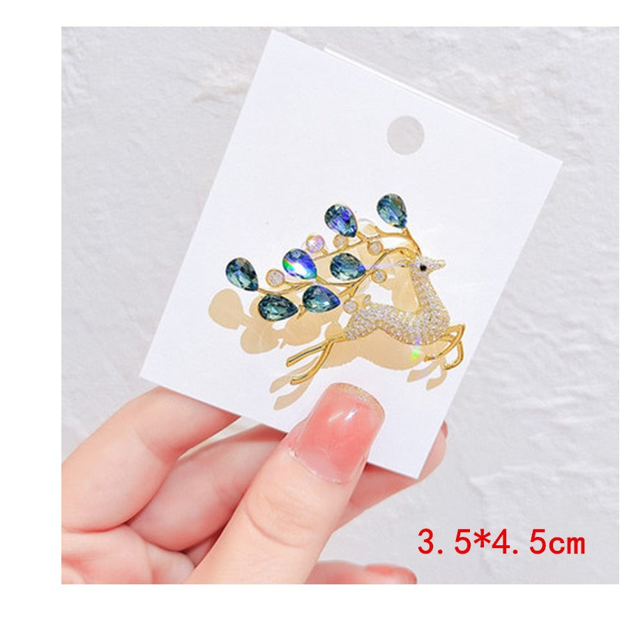 Close-up of blue crystal brooch design