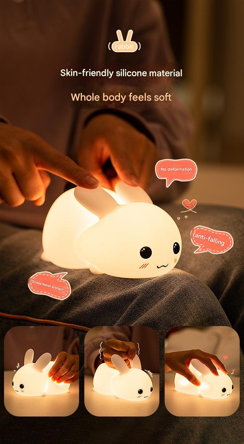 Comforting rabbit-shaped night light on bedside table