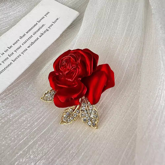 elegant rose flower pin displayed on table image 6
