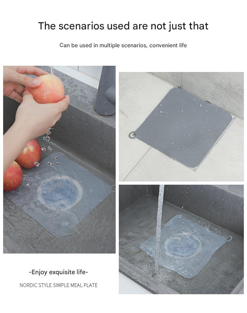 Clog-preventing drain mat