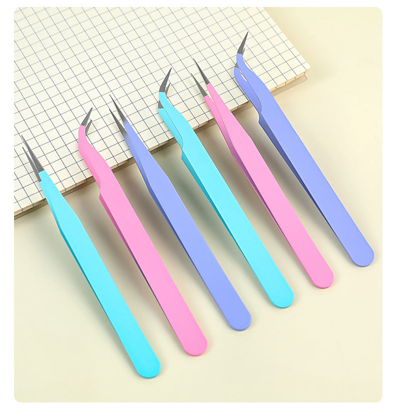 craft tweezers holding paper detail