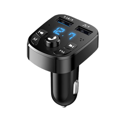 car charger beside manual on white