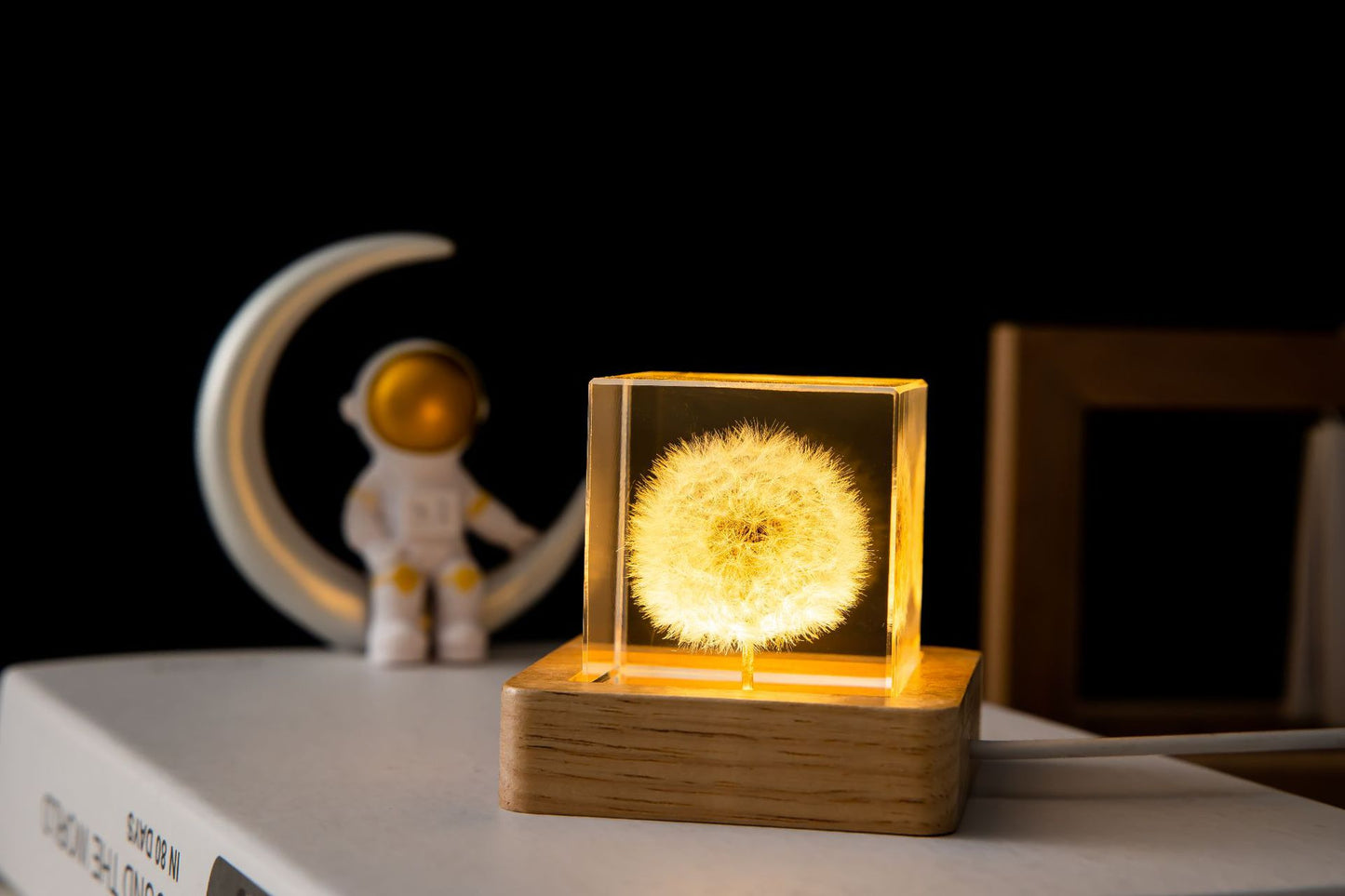 artistic LED-lit dandelion crystal ball on wooden stand