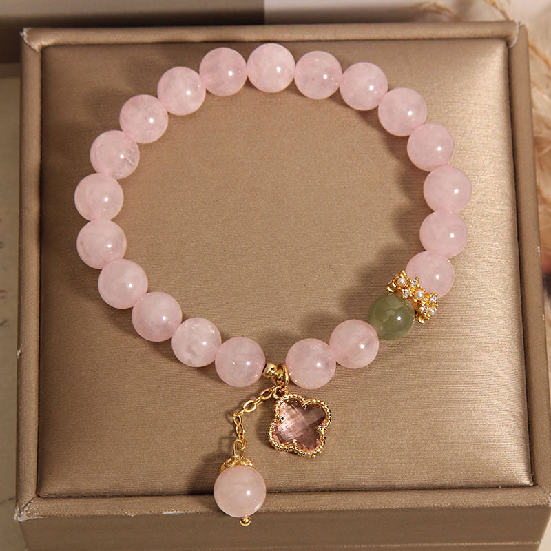 Close-up of pink quartz bracelet
