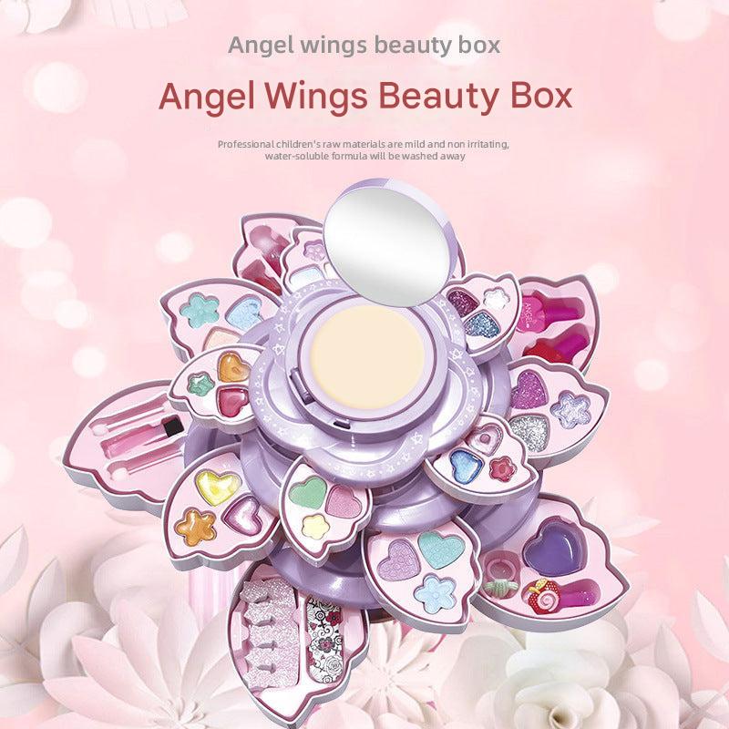 Child playing with makeup kit and angel wings design