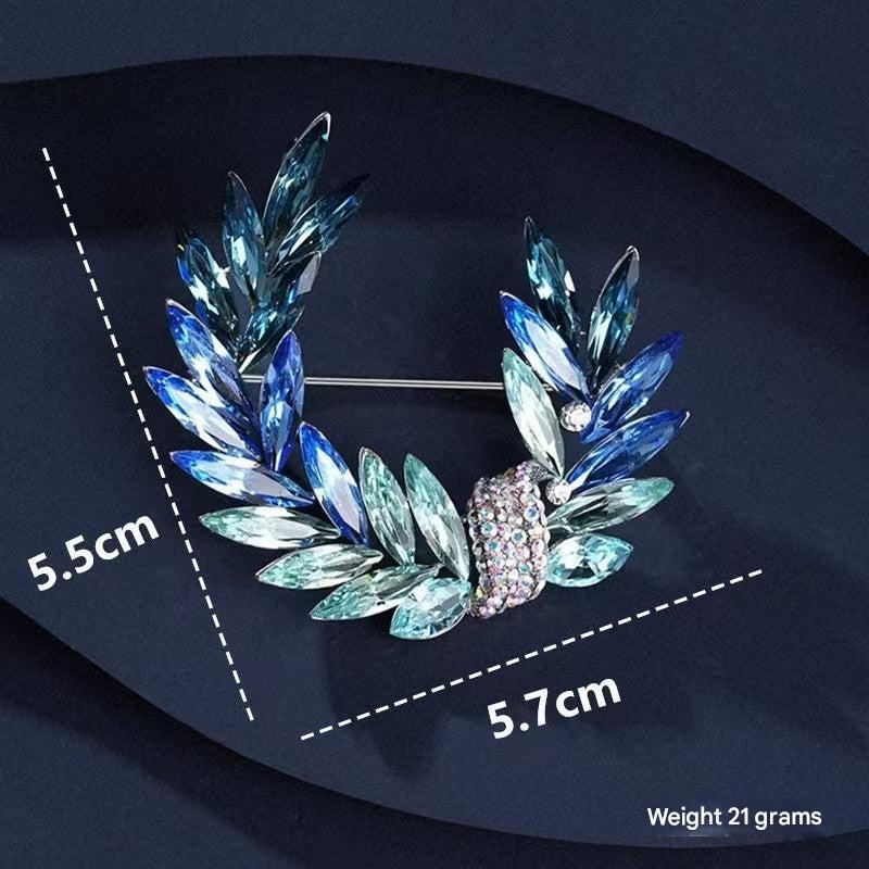 Close-up of moon crystal brooch shining