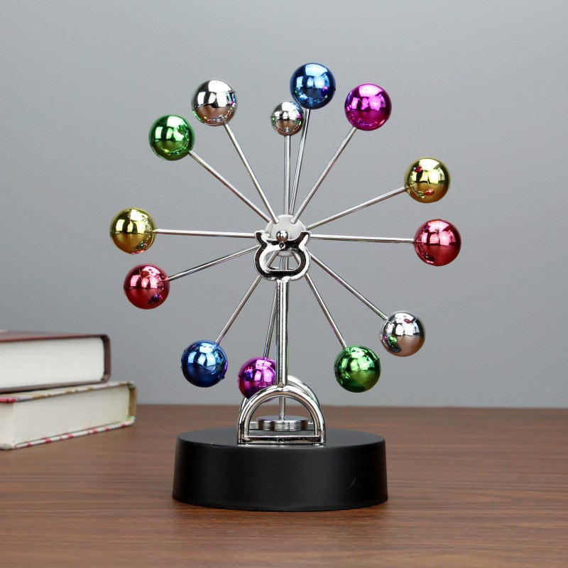 Newton pendulum with metallic finish