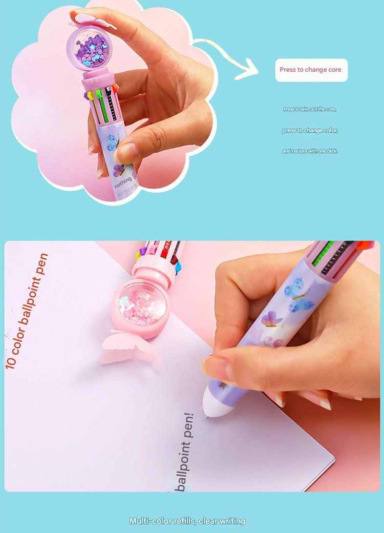 Student using colorful ballpoint pen during exam image