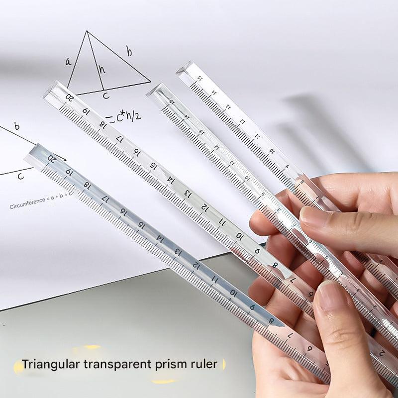 transparent acrylic triangular ruler on desk