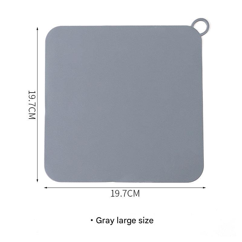 Clog-preventing drain mat
