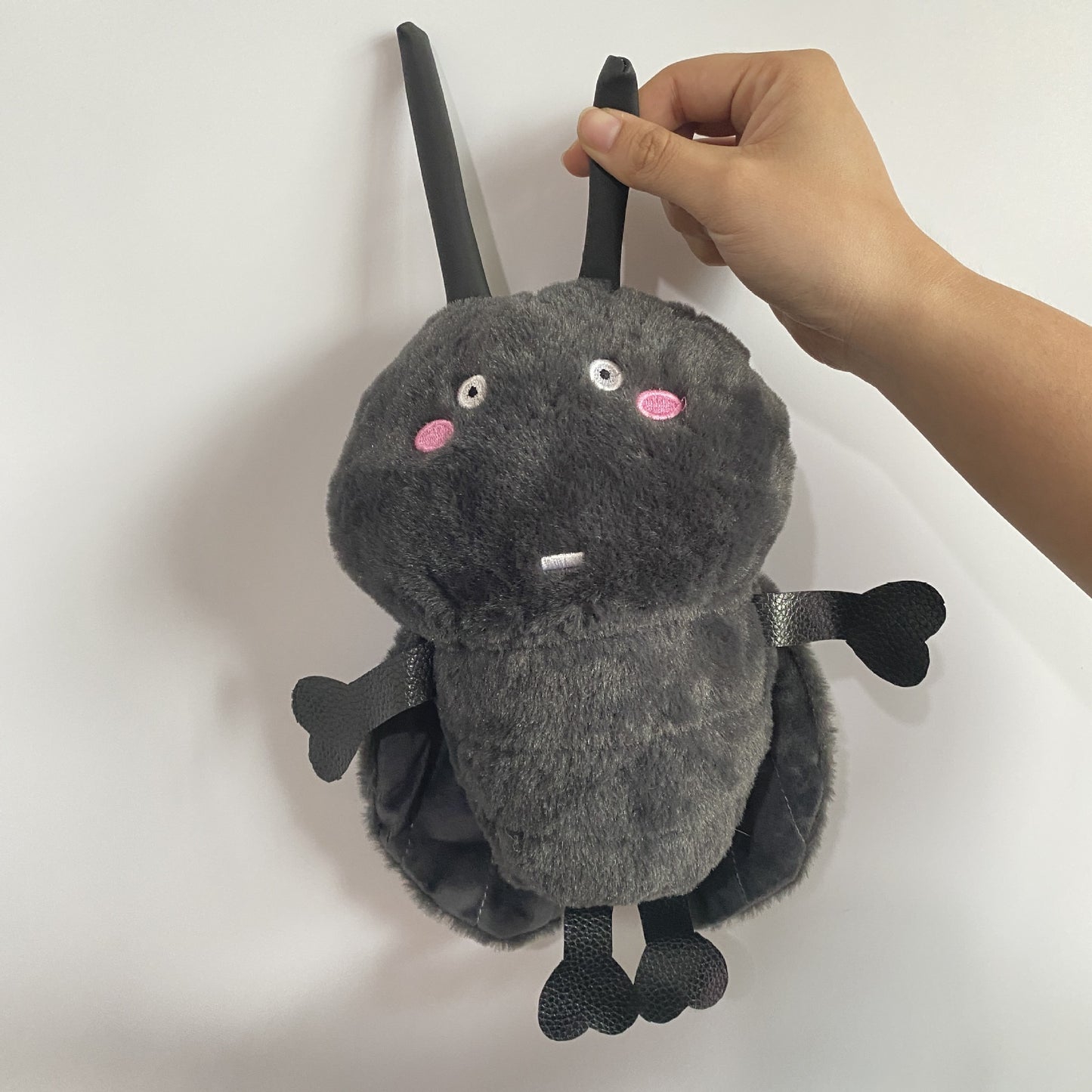 quirky roach plush toy