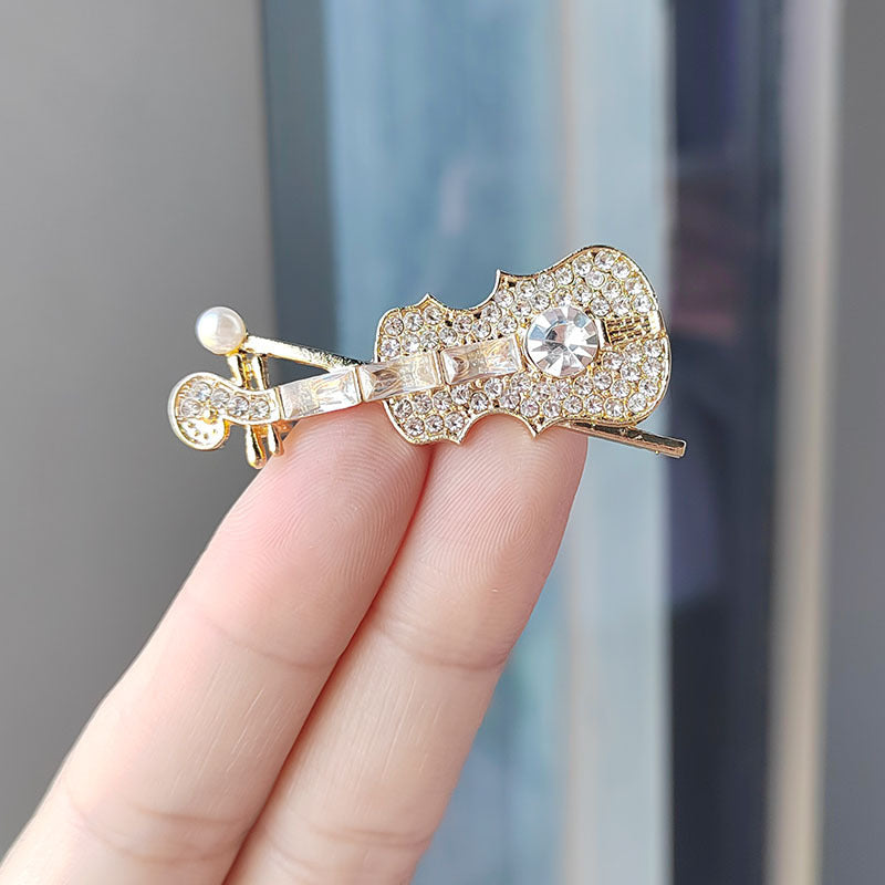 Violin Brooch on Fabric
