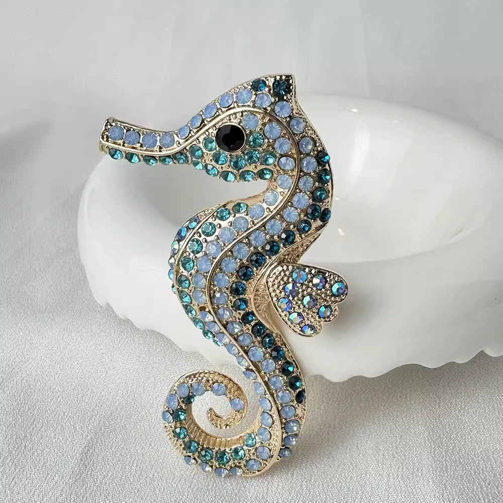 Stylish sea horse pin on model