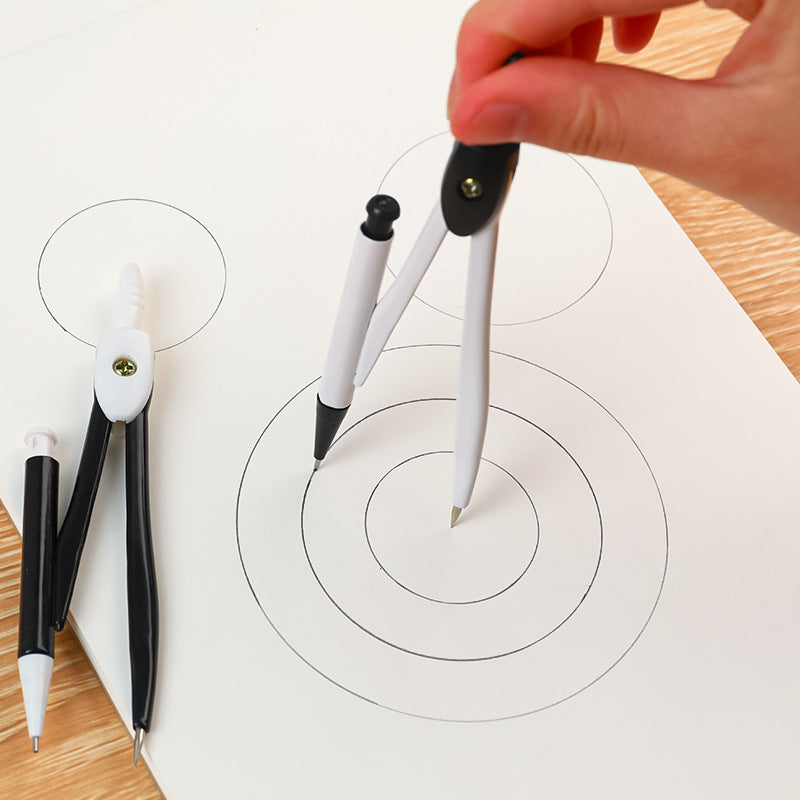 compass set displayed with pencil and geometric tools