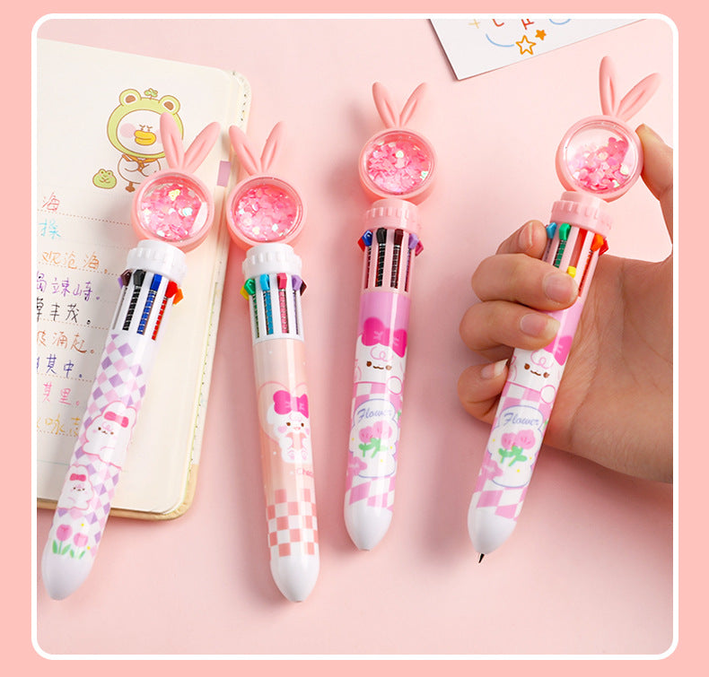 playful cartoon rabbit multi-color pen on desk