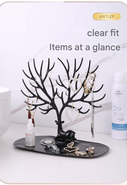 Modern white jewelry stand in home setting