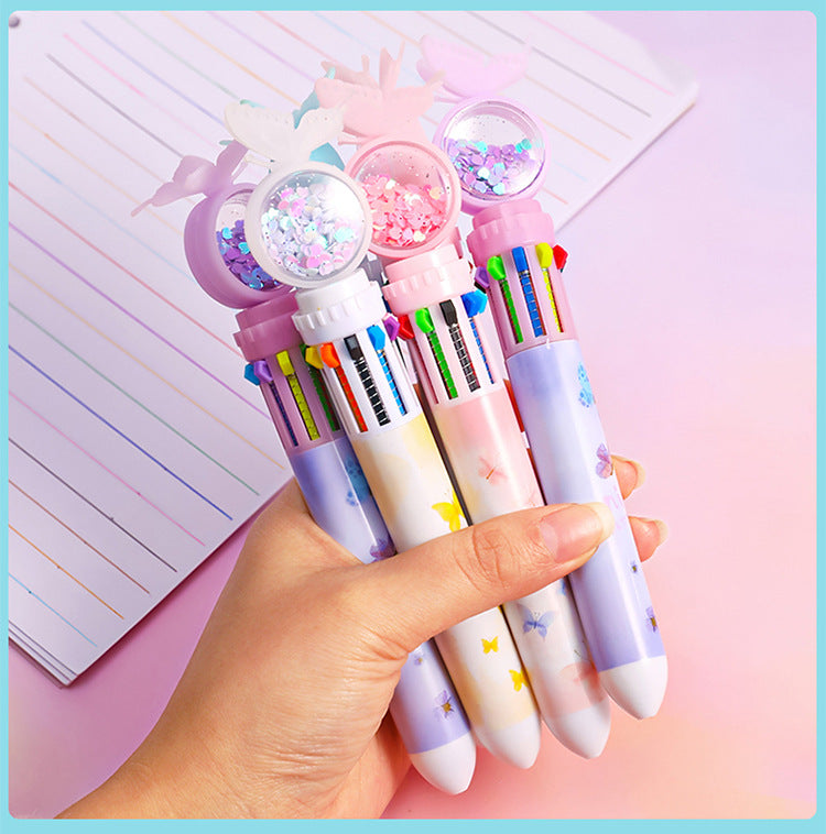 Girl coloring with multicolor ballpoint pen image
