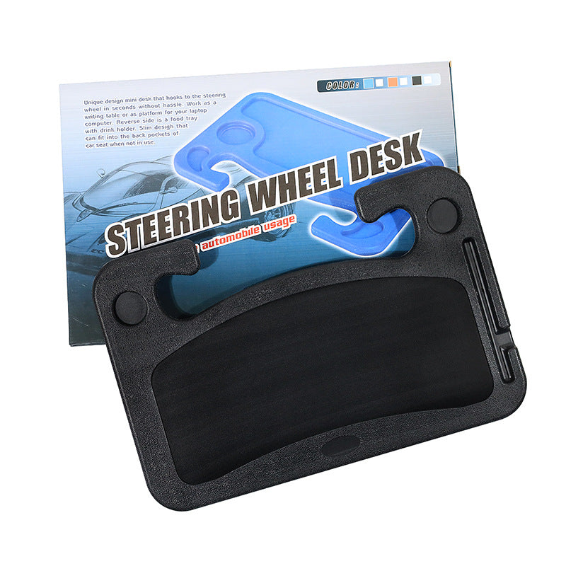 grey car steering wheel laptop support