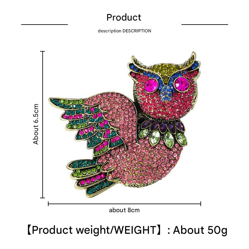 Owl brooch displayed on coat