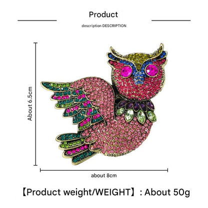 Owl brooch displayed on coat