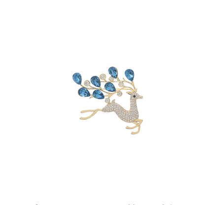 Close-up of blue crystal brooch design