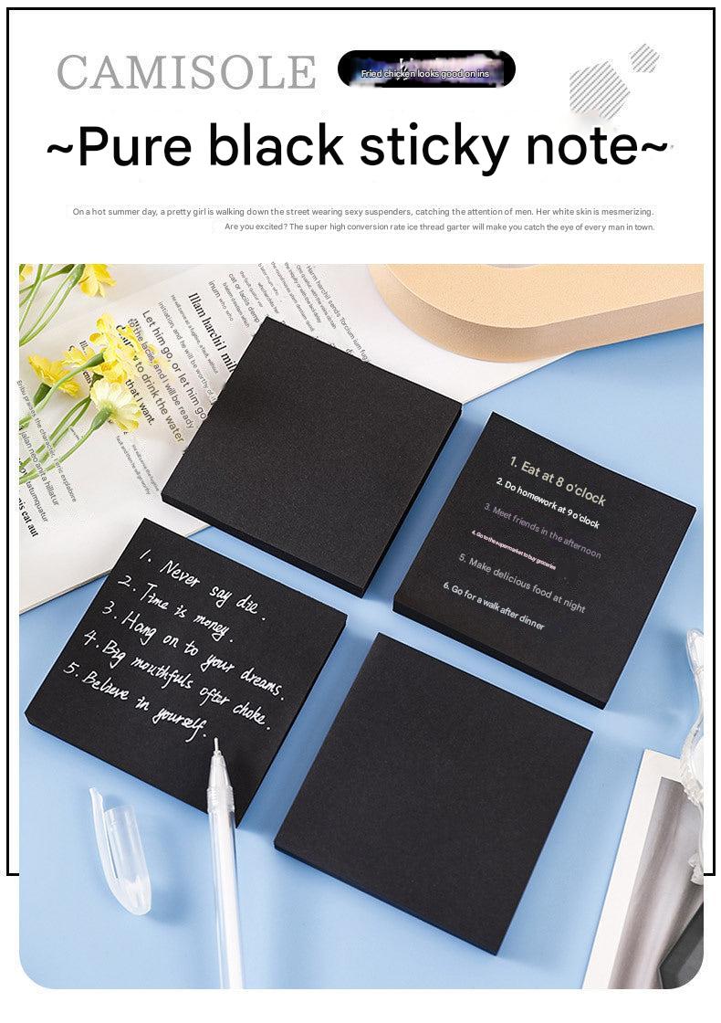 stack of black post-it notes